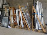 many different types of windows and doors in this warehouse