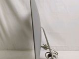 an image of a computer monitor with a cord plugged into it