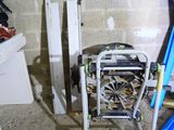 an image of a bike wheel on a stand in a garage