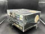 a clear box with some stickers on top of it