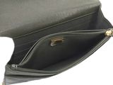 the inside of a black purse with a zipper open