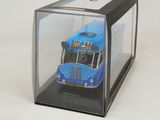 a blue bus in a clear box on a white surface