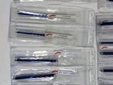 a lot of toothbrushes that are in a bag