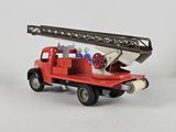 a toy fire truck with a ladder on the back of it