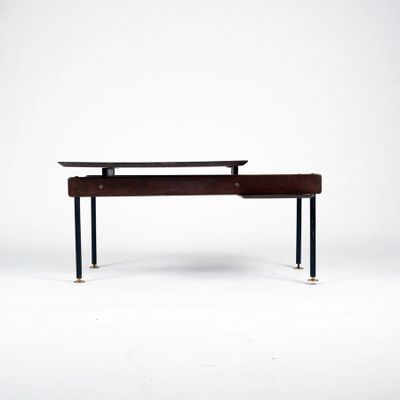 an image of a desk with a wooden top and metal legs