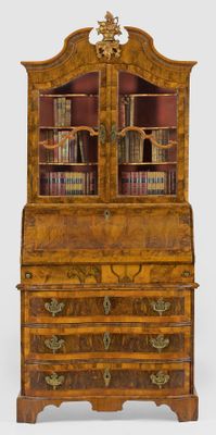 an image of a wooden bookcase with many books on top of it