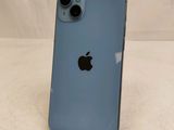 a close up of a blue iphone sitting on top of a table