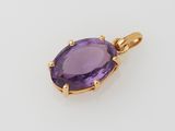 un pendentif en améthorate et diamant