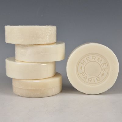 several soap bars stacked on top of each other on a table