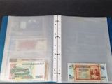 a binder with a lot of money inside of it