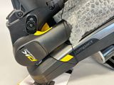 a close up of a bike with a seat and handlebars