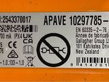 a sticker on the back of an orange vehicle
