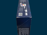 a box of wii remotes sitting on a blue surface