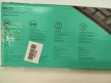 boxed box of a computer keyboard on a table with a barcode on it