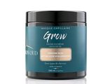 le pot de crème coiffante « Groom » est posé sur une surface blanche