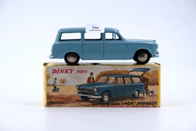 a blue toy car sitting on top of a box