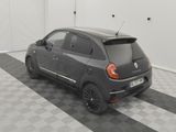 a picture of a small car parked in a garage