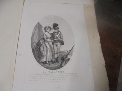an old book with a picture of a man and a woman