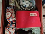 a red box with a lot of different items in it