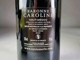 a close up of a bottle of wine on a table