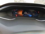 a car dashboard with a digital display on it