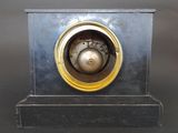a clock that is sitting on top of a table