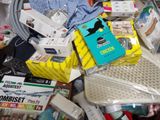 a pile of assorted items that are on a table