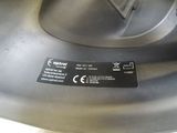 a close up of a metal object with a label on it