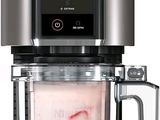 une cafetière surmontée d'un mixeur