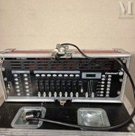 a case that has a mixer in it on top of a table