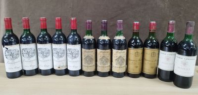 plusieurs bouteilles de vin sont alignées sur une table