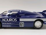 a model of a blue race car on a white background