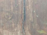 a picture of a painting of a face on a wall