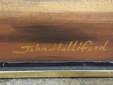 an image of a close up of a painting on a wooden surface