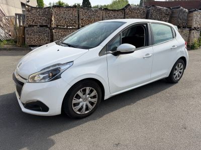 a picture of a white car parked in a parking lot
