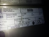 a label on the back of a machine that has a price tag
