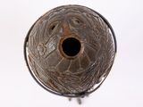 a close up of a metal object with a hole in it