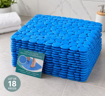 a stack of blue pebbles sitting on top of a tiled floor