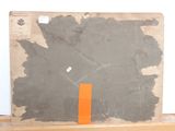 a picture of a piece of cardboard on a shelf