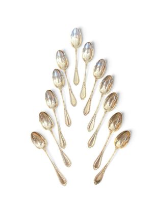 a lot of spoons and spoon spoons arranged in the shape of a tree