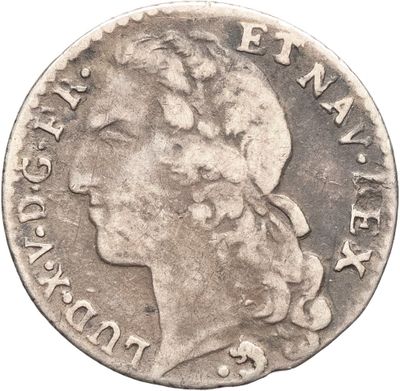 Pièce en argent avec la tête d'une femme de profil
