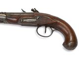a close up of a gun on a white surface with a white background