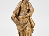 an image of a statue of a man holding a bag