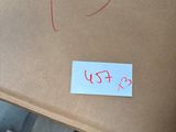 a cardboard box with a sticker that says yes on it