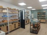 a picture of a room with shelves and shelves filled with pottery