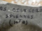 a rock with writing on it sitting on a table