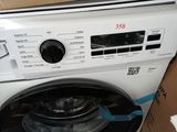 a washing machine that is sitting in a box