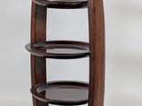 an image of a wooden shelf with three shelves