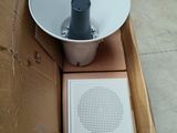 a box that has a speaker in it and a box with a speaker inside of it