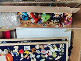 two shelves with magnets on them in a room